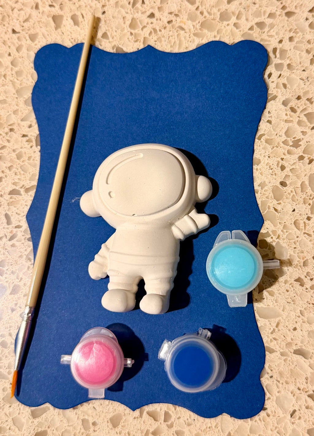 Original photograph of ArtJoy astronaut plaster painting kit with paints and brush