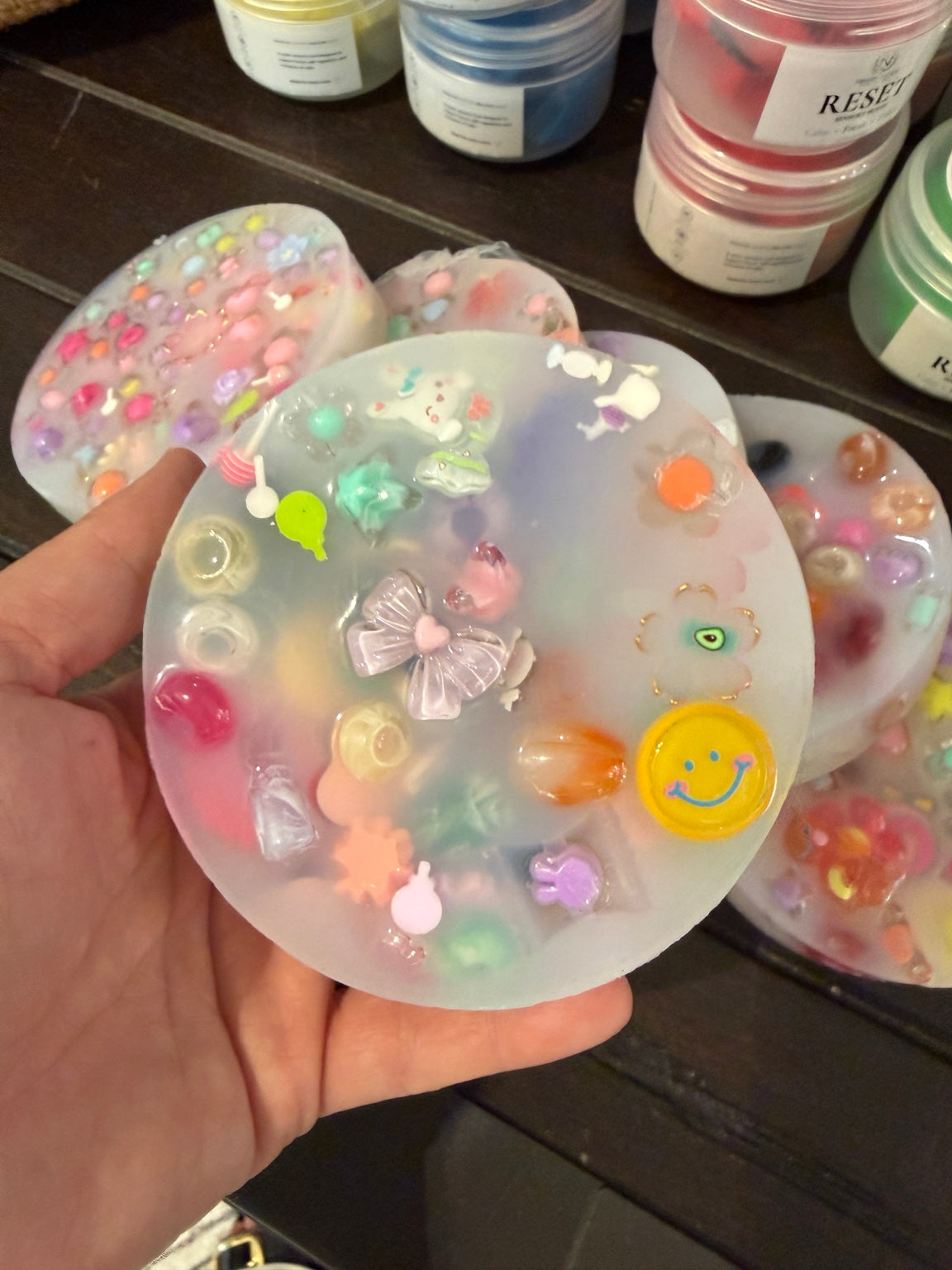 Original photo of silicone picky pad with colorful embedded charms