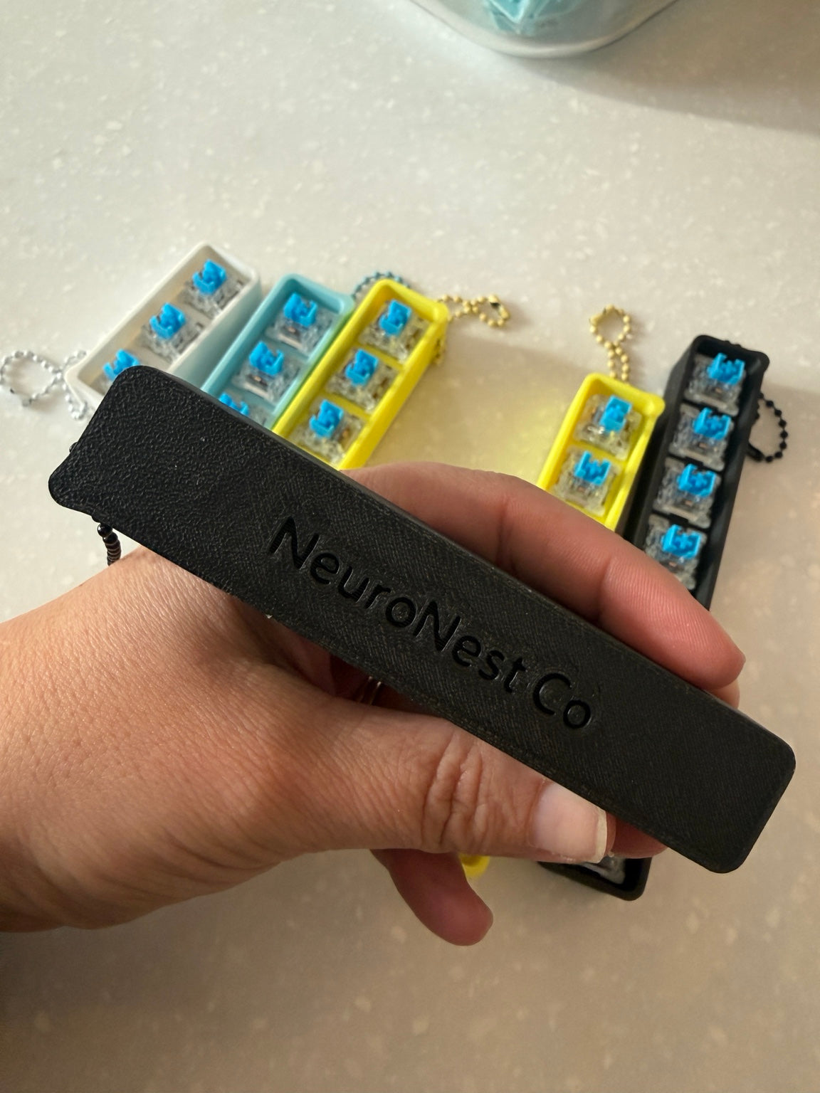 NeuroNest Co branding on the back of a clicker