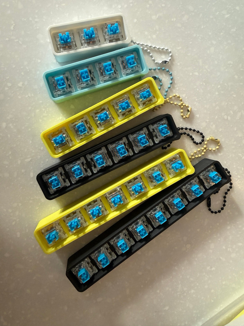 Clicker bases in sizes three through eight keys